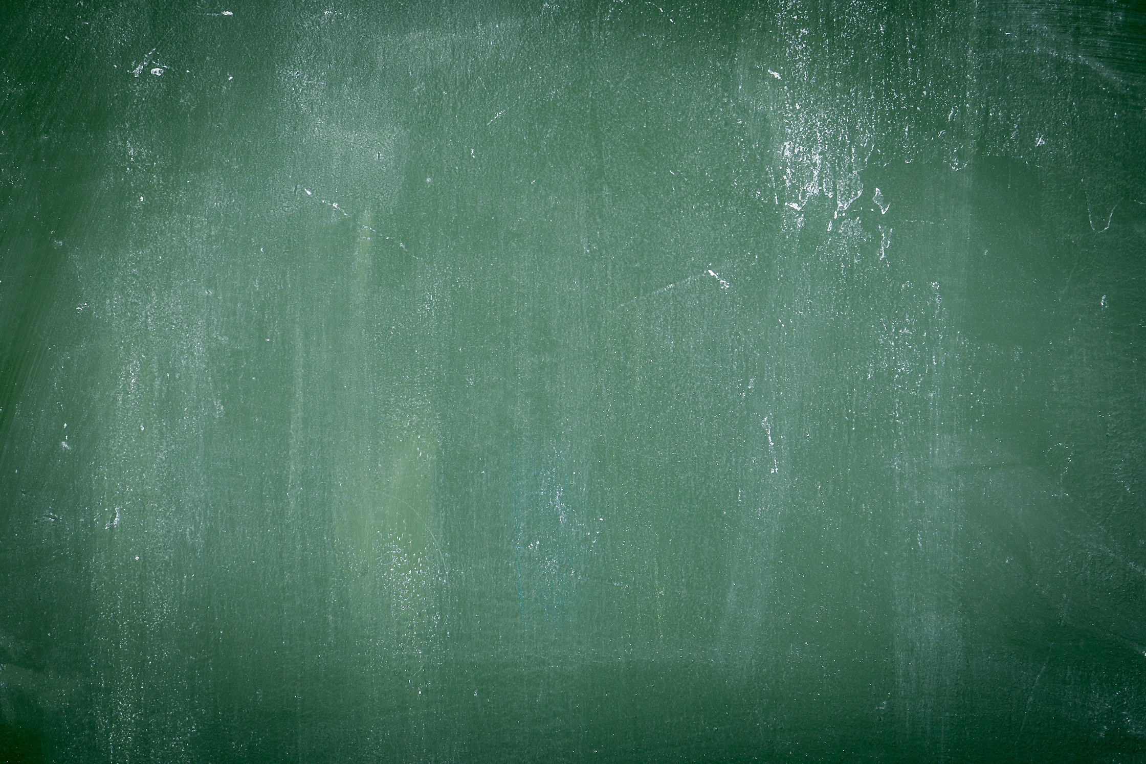 Green chalk board with texture and white chalk marks